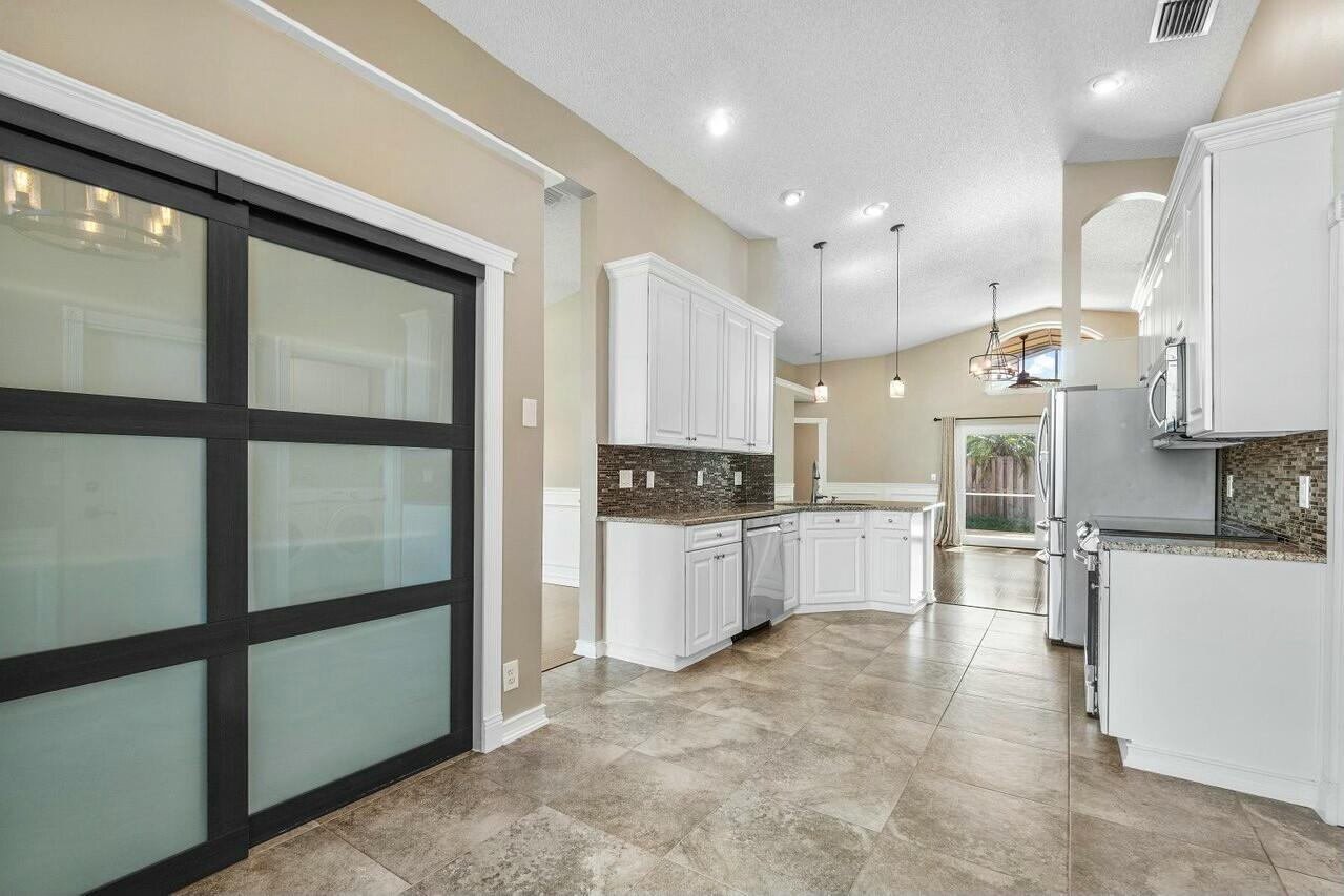 6304 Adams Street Jupiter, FL 33458 - Photo 12 of 32 tempImageBWfA9l