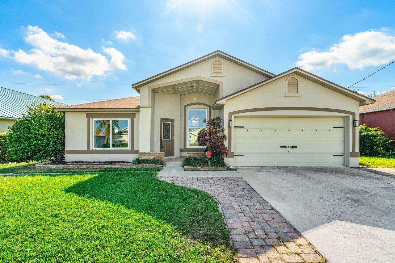6304 Adams Street Jupiter, FL 33458 - Photo 2 of 32 Welcome Home
