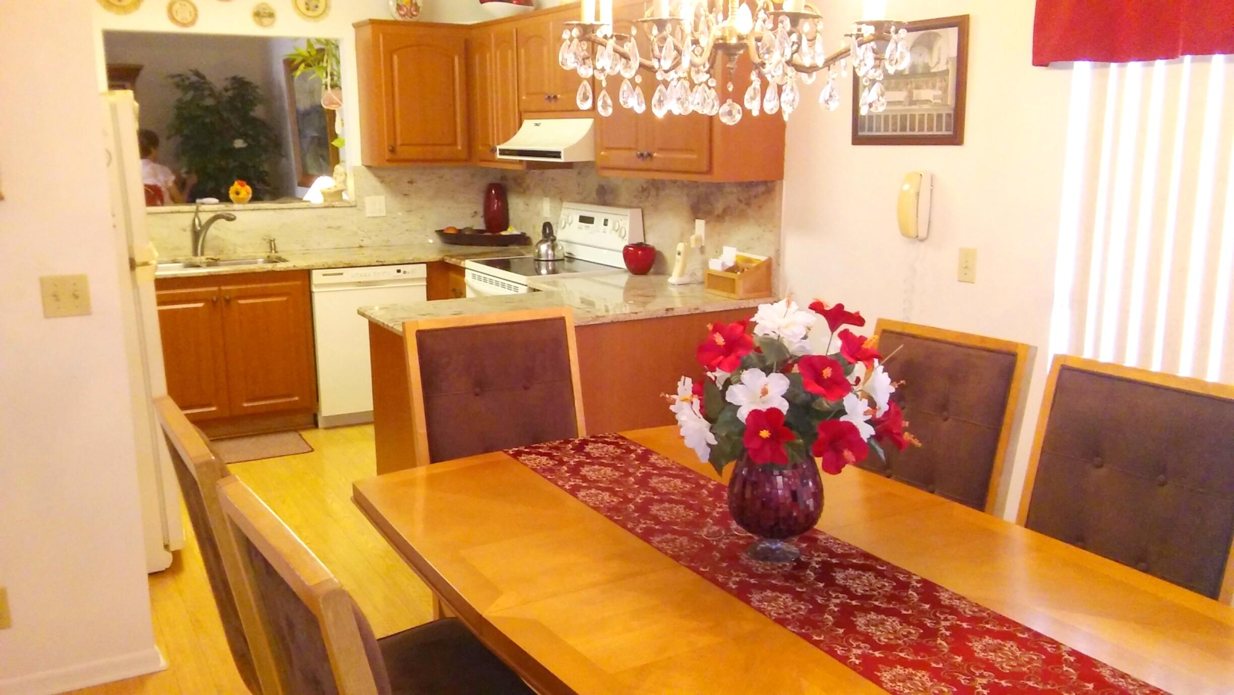 9422 Saddlebrook Drive Boca Raton, FL 33496 - Photo 8 of 20 Dining Room to Kit