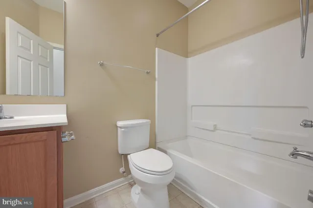 a bathroom with a toilet and a sink