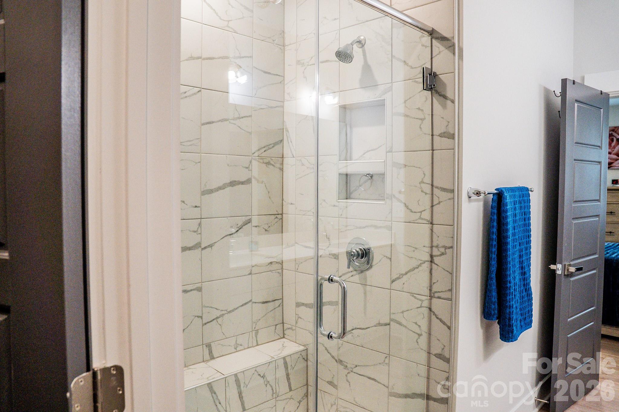 6288 Culbert Street Harrisburg, NC 28075 - Photo 17 of 40 a bathroom with a shower