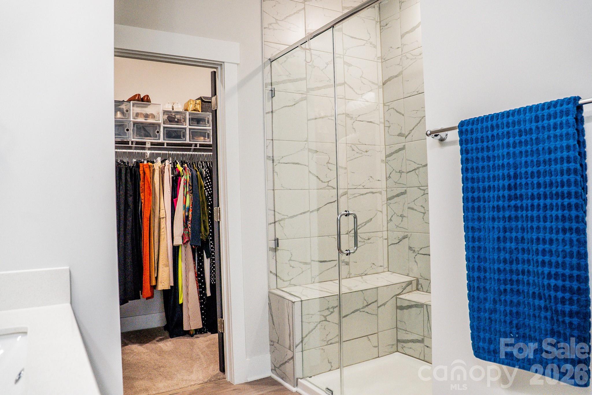 6288 Culbert Street Harrisburg, NC 28075 - Photo 18 of 40 a bathroom with a shower and a sink