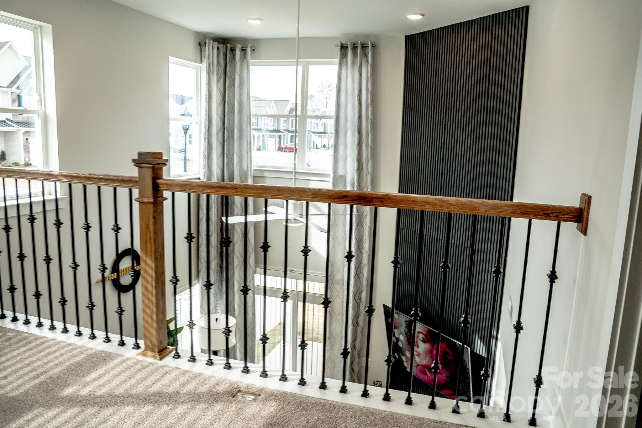 6288 Culbert Street Harrisburg, NC 28075 - Photo 24 of 40 a view of a balcony with wooden floor