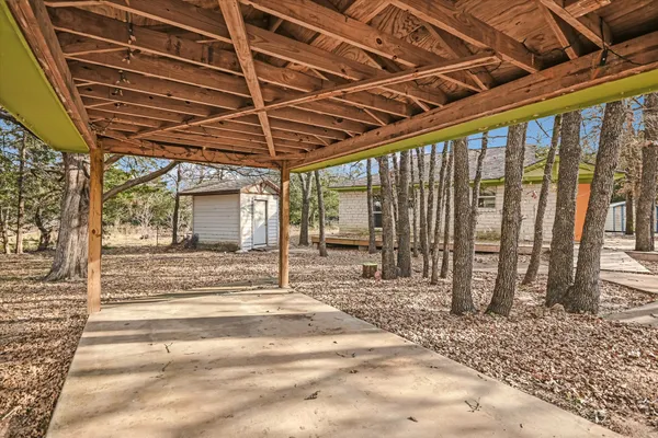a view of a backyard of a house
