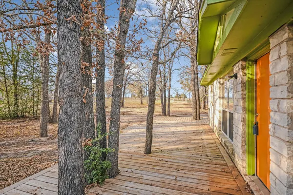 a view of a pathway both side of the house