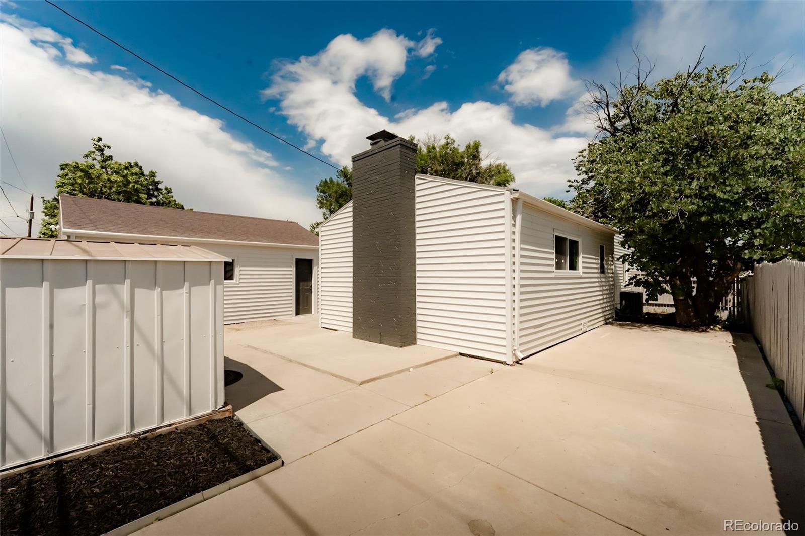 1279 South Raritan Street Denver, CO 80223 - Photo 25 of 25 a view of a house with a patio