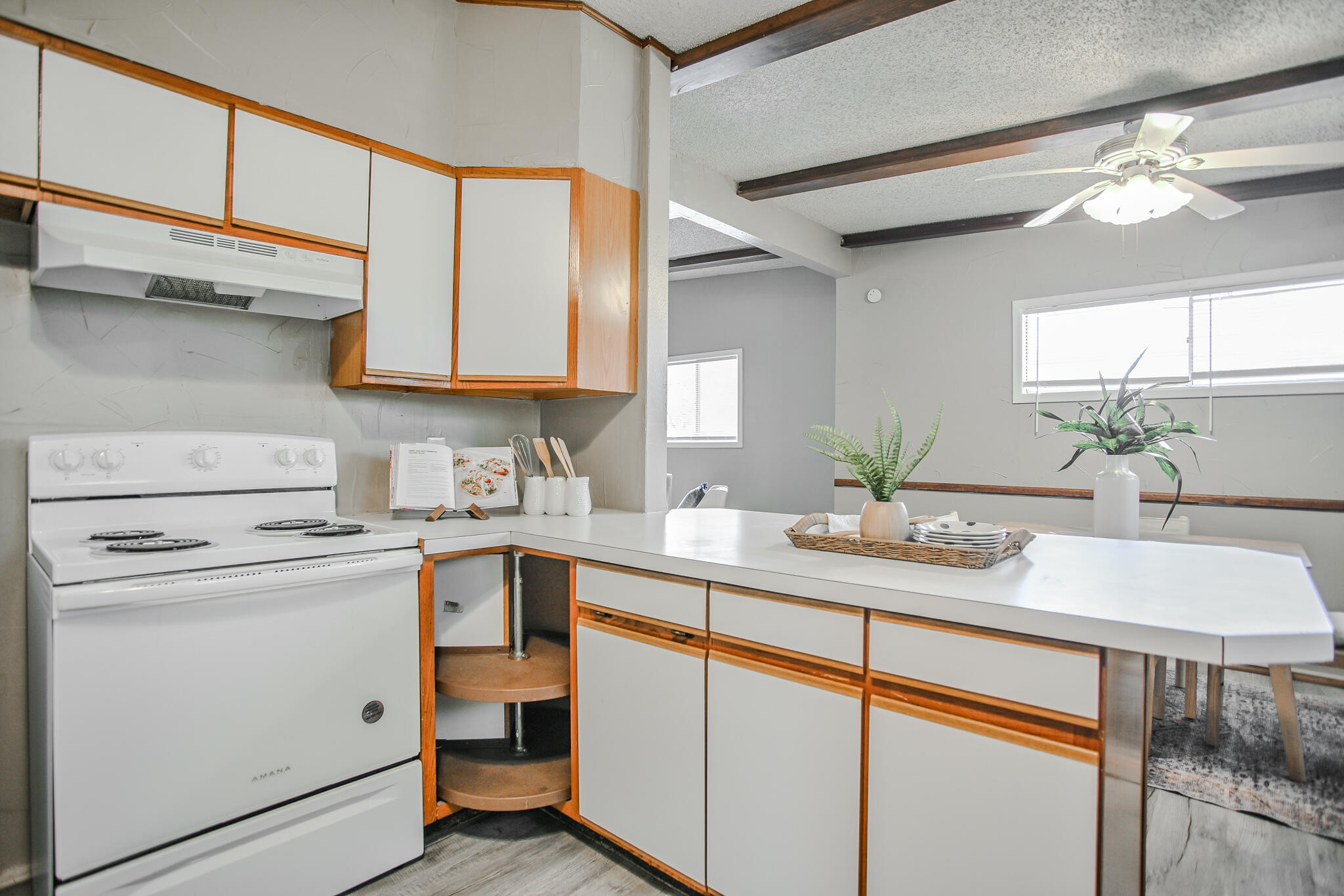4405 44th Street Lubbock, TX 79414 - Photo 14 of 28 a kitchen with a sink cabinets and window