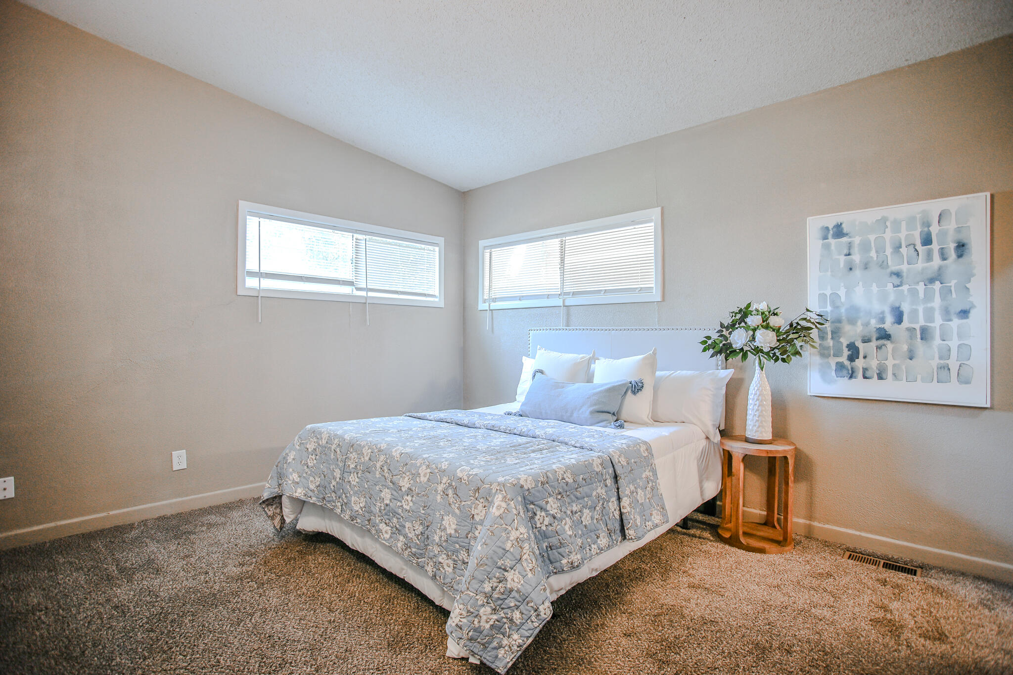 4405 44th Street Lubbock, TX 79414 - Photo 15 of 28 a bedroom with a bed and a window