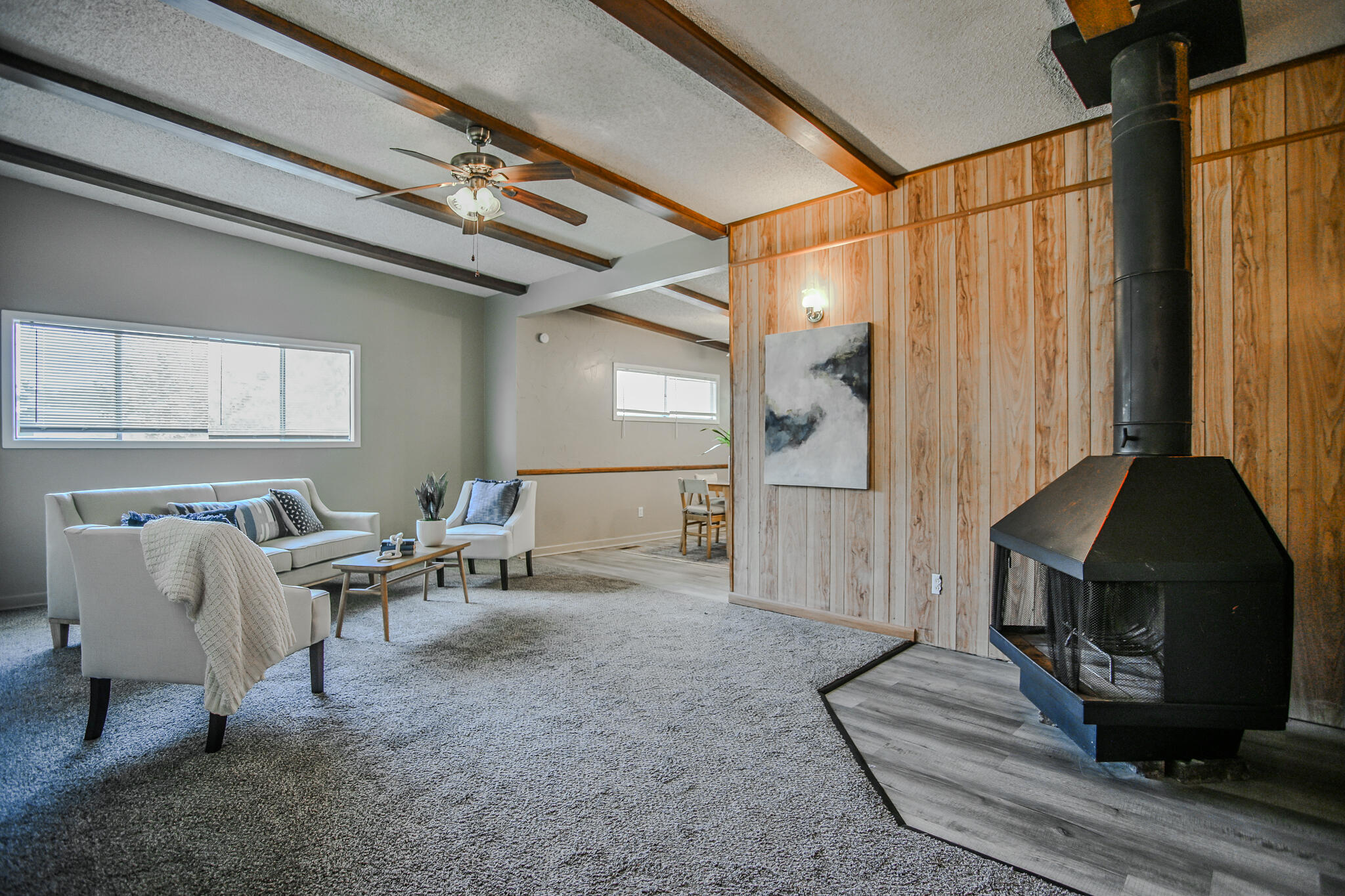 4405 44th Street Lubbock, TX 79414 - Photo 2 of 28 a living room with furniture and a fireplace