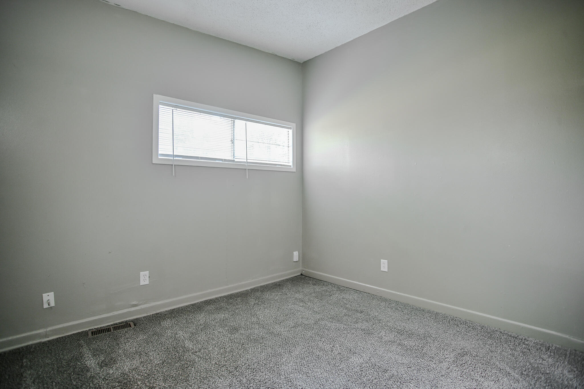 4405 44th Street Lubbock, TX 79414 - Photo 24 of 28 an empty room with a window