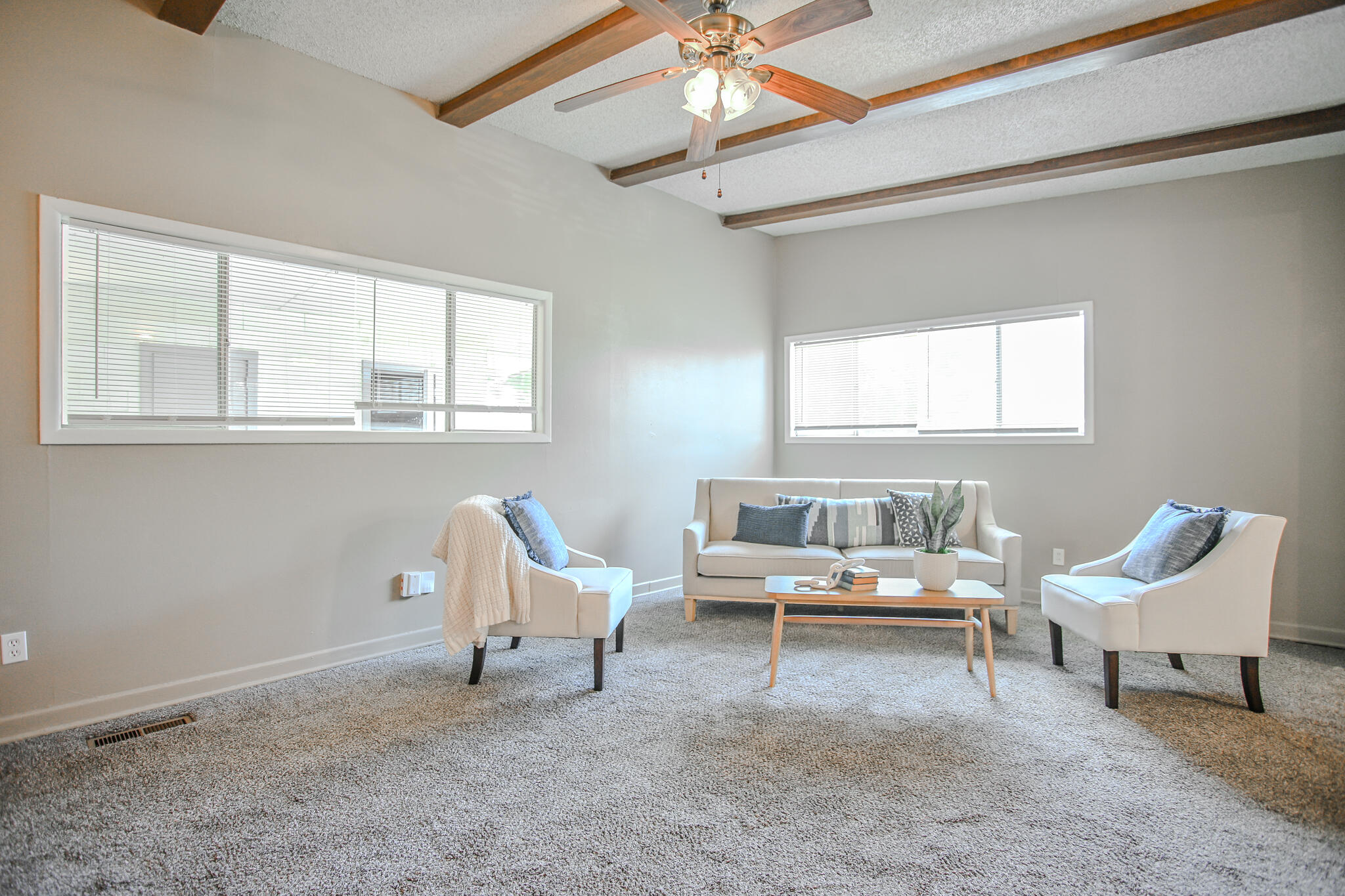 4405 44th Street Lubbock, TX 79414 - Photo 3 of 28 a living room with furniture and a window