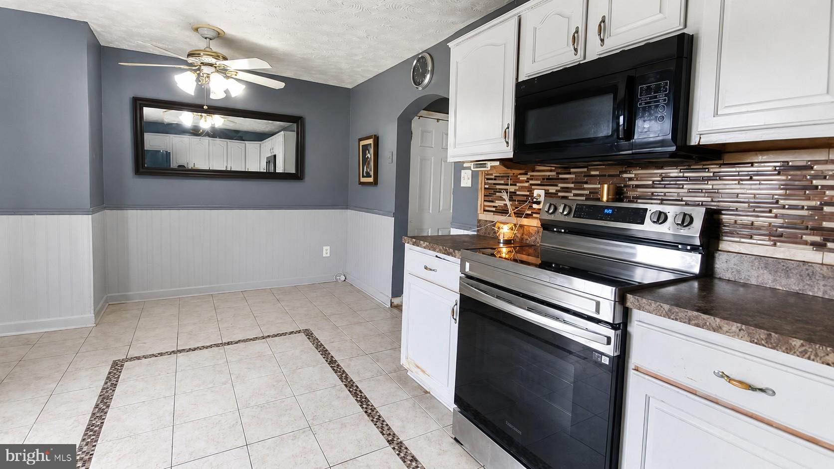1 Talister Court Rosedale, MD 21237 - Photo 3 of 13 Modern kitchen with stylish accents.