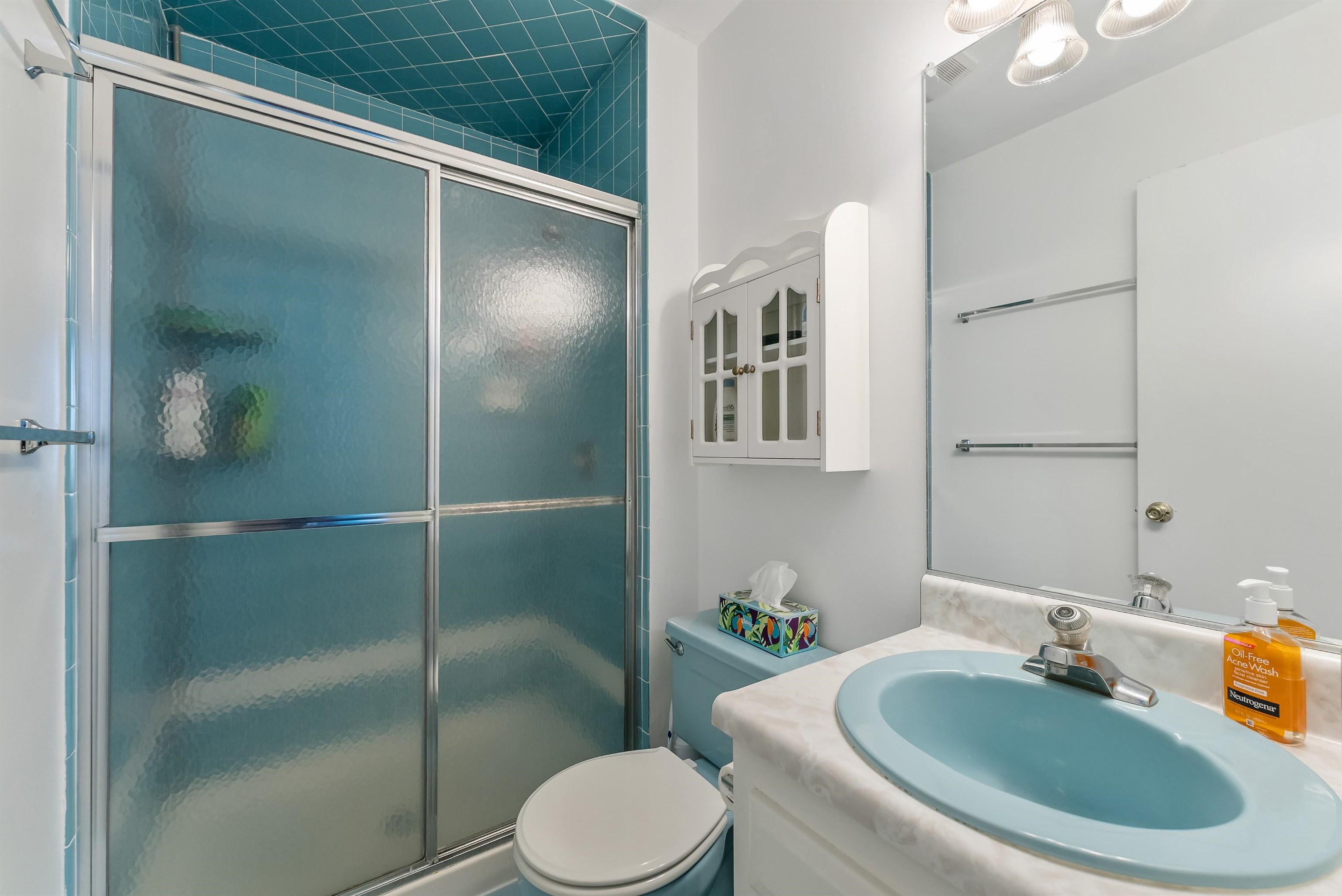 280 79th Street, Unit 1 Avalon, NJ 08202 - Photo 16 of 21 a bathroom with a sink and toilet