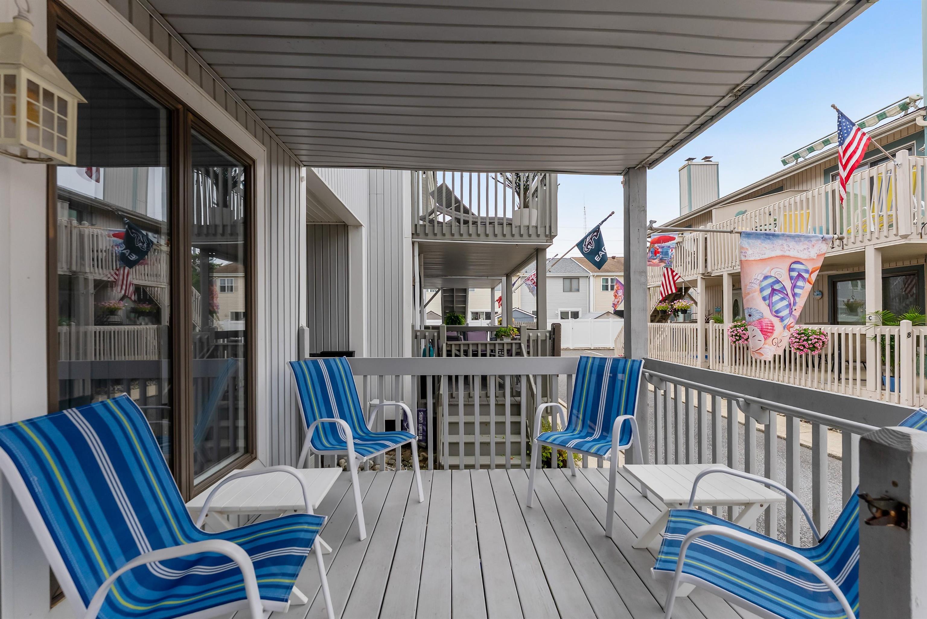 280 79th Street, Unit 1 Avalon, NJ 08202 - Photo 2 of 21 a view of living room kitchen with furniture and wooden floor