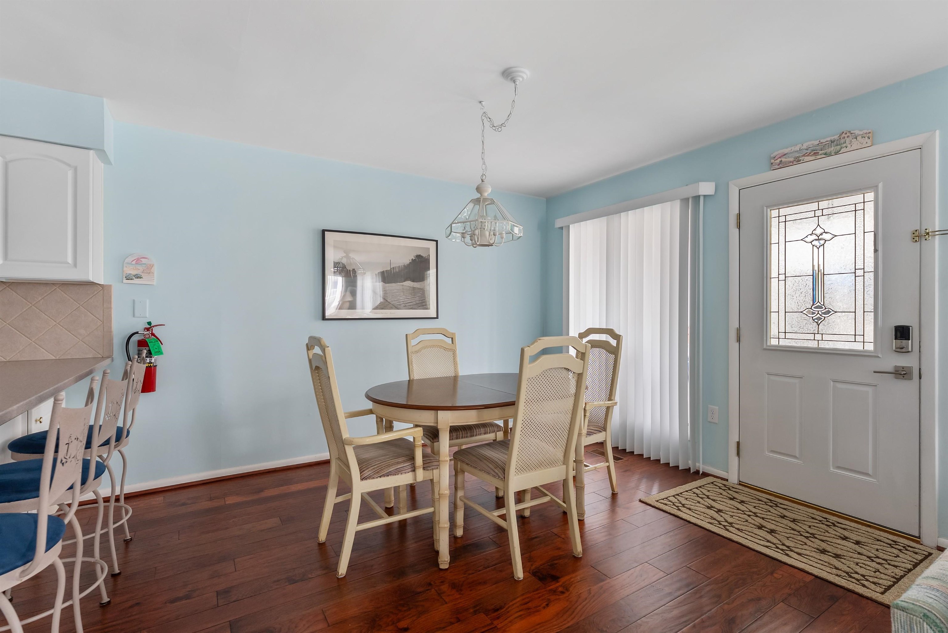280 79th Street, Unit 1 Avalon, NJ 08202 - Photo 10 of 21 a view of a dining room with furniture window and wooden floor
