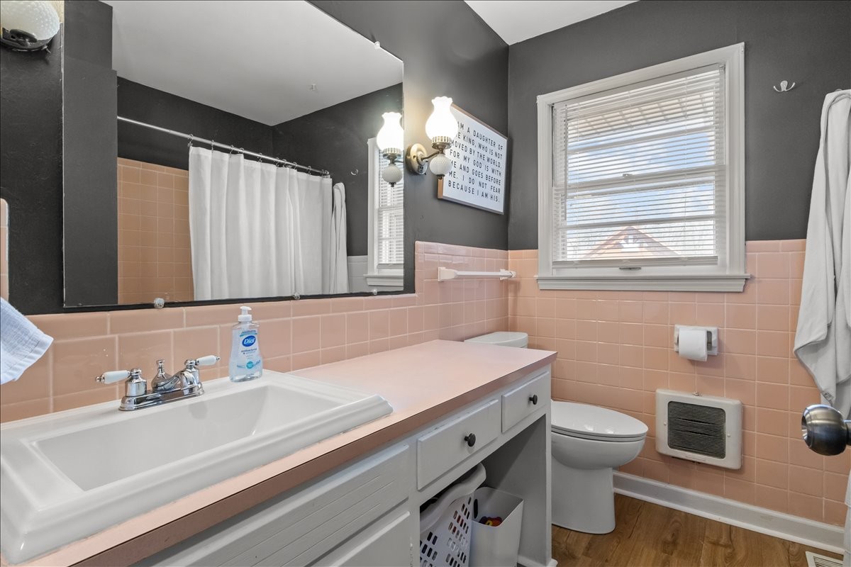 1112 Bridgette Street Paris, TN 38242 - Photo 22 of 34 a bathroom with a sink and a mirror