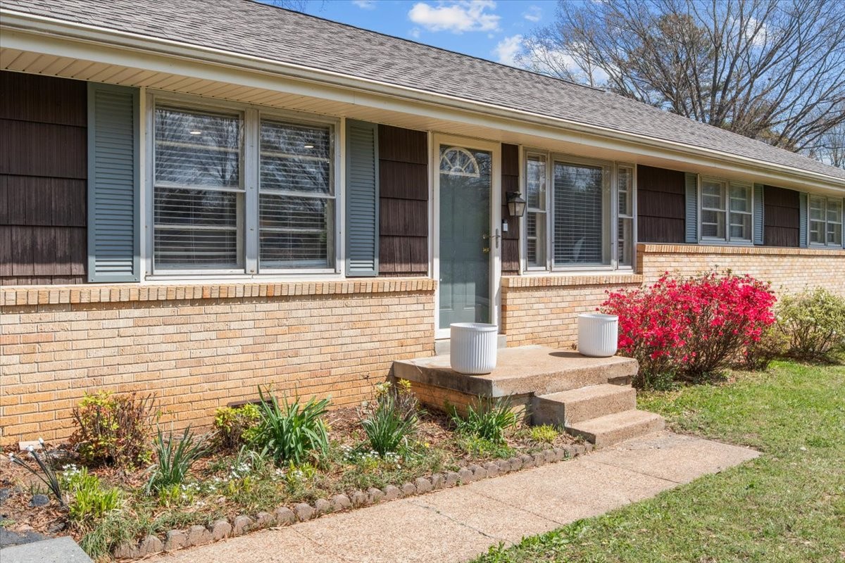1112 Bridgette Street Paris, TN 38242 - Photo 3 of 34 a front view of a house with an outdoor space