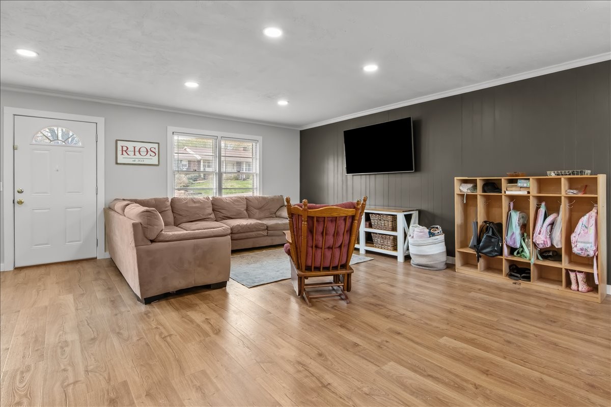 1112 Bridgette Street Paris, TN 38242 - Photo 4 of 34 a living room with furniture and a flat screen tv