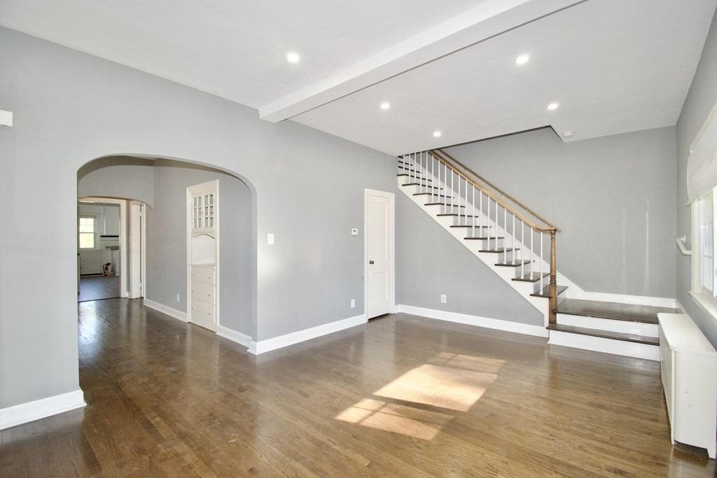 102 Florence Street Springfield, MA 01105 - Photo 6 of 30 a view of entryway and hall with wooden floor