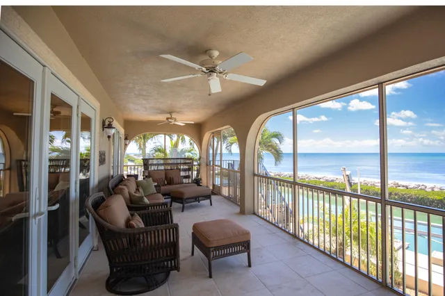 a view of house with outdoor space and swimming pool