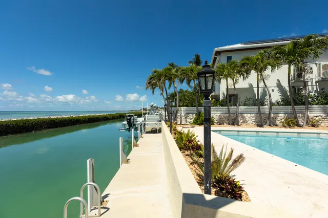 a dining room with furniture and outdoor view