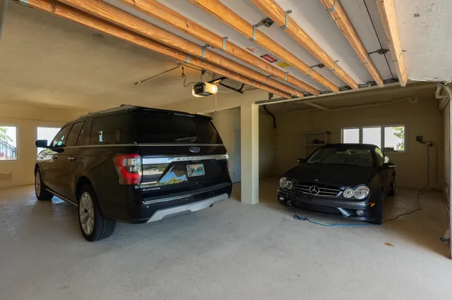 a view of a house with a flower garden
