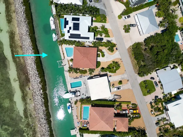 a view of a house with a flower garden