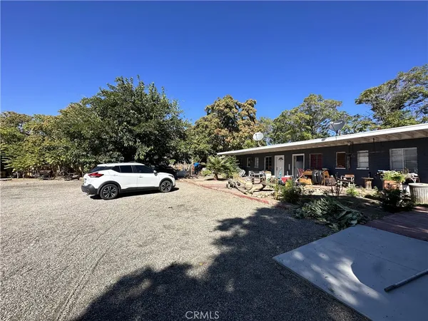 a view of car parked in front of house