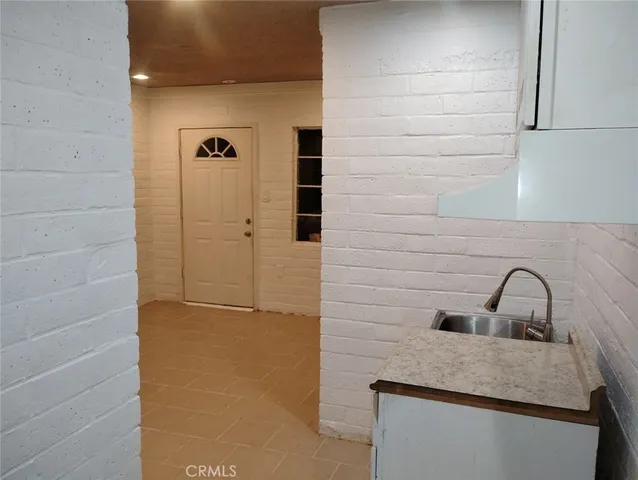 a bathroom with a sink and a shower