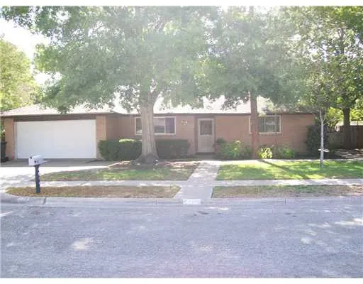 a view of backyard of house