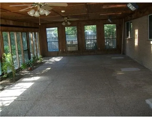 a view of a building with porch and outdoor space