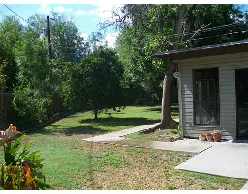 a front view of a house with yard