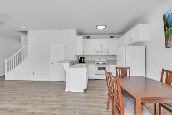 a view of kitchen with breakfast area