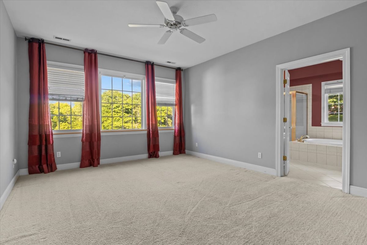 2440 Maple Grove Road Dickson, TN 37055 - Photo 19 of 87 an empty room with windows and closet