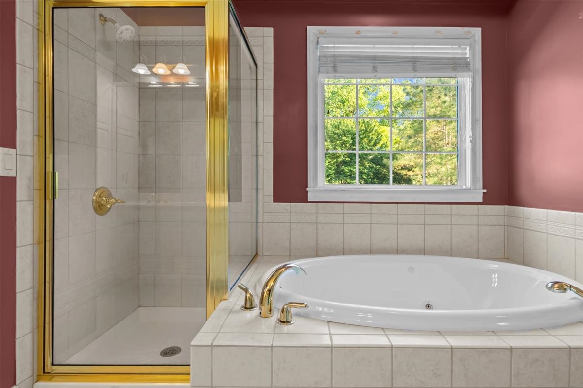 2440 Maple Grove Road Dickson, TN 37055 - Photo 21 of 87 a white bath tub sitting next to a window