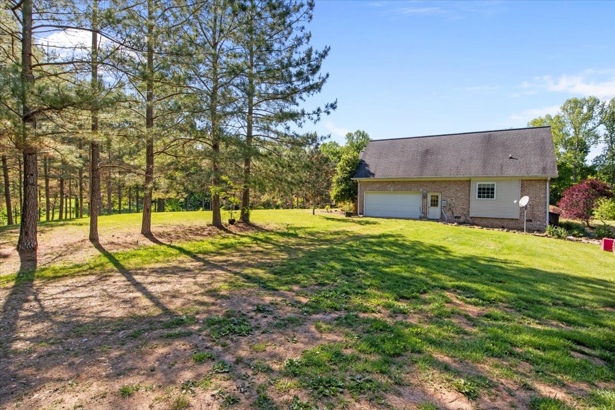 2440 Maple Grove Road Dickson, TN 37055 - Photo 42 of 87 a view of a house with a yard