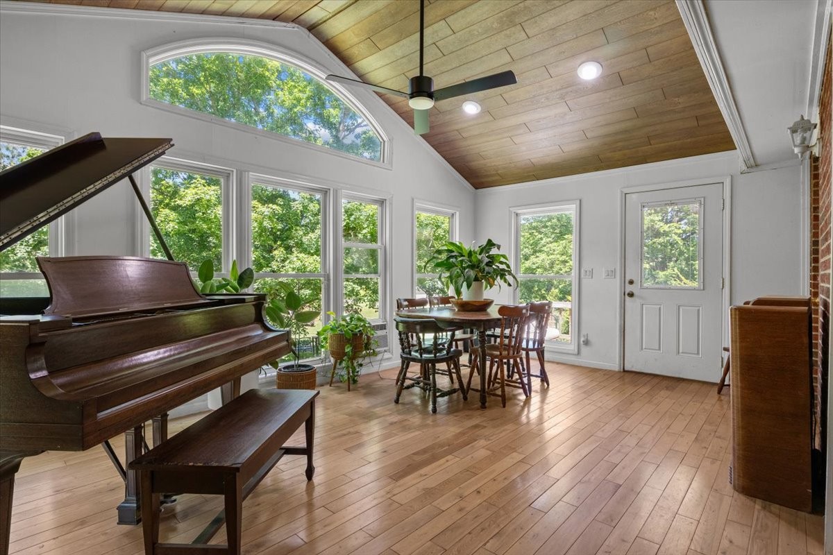 2440 Maple Grove Road Dickson, TN 37055 - Photo 62 of 87 a view of a dining room with furniture window and wooden floor