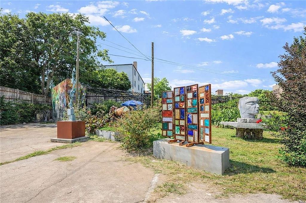 161 Mangum Street Southwest, Unit 204 Atlanta, GA 30313 - Photo 22 of 24 a view of potted plants on a sidewalk
