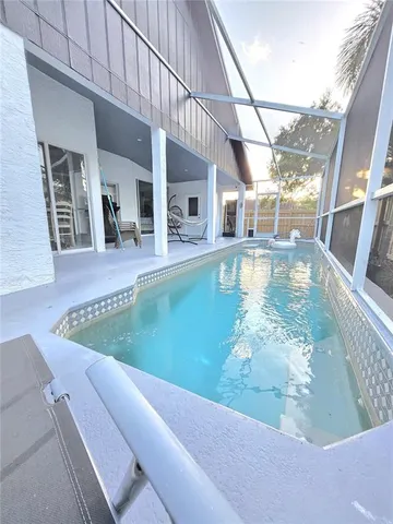 a view of a living room and dining room