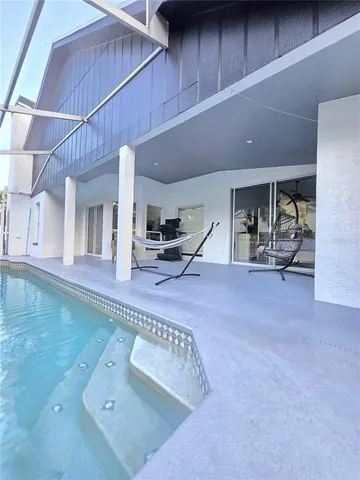 a view of a roof deck with wooden fence and wooden floor
