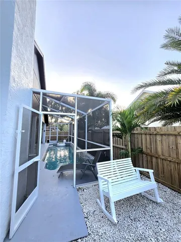 a kitchen with a stove a sink and a refrigerator