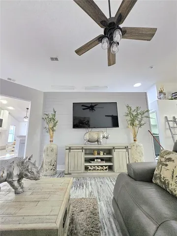 a bedroom with a bed and cabinets