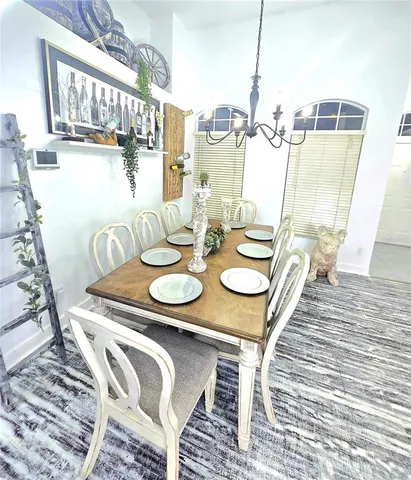 a bed room with a bed and a chair