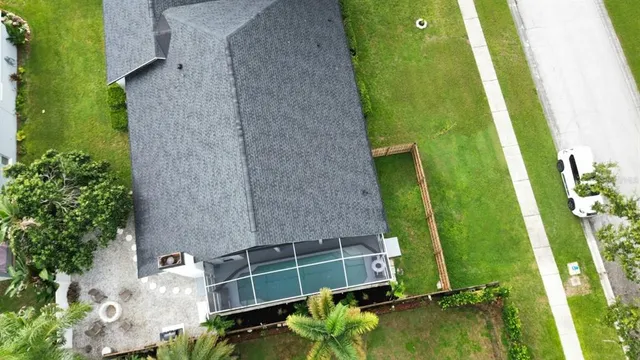 a view of a swimming pool with a porch