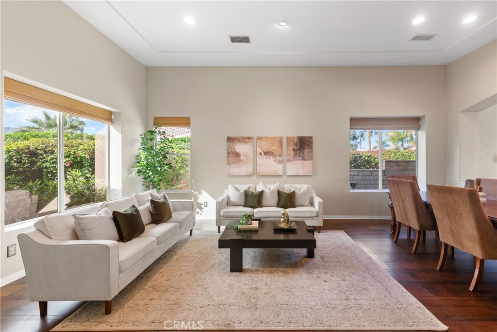 70 Rocio Court Palm Desert, CA 92260 - Photo 6 of 40 a living room with furniture and a large window