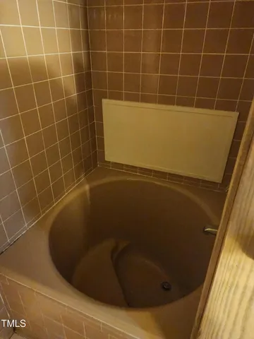 a close up of a bathtub