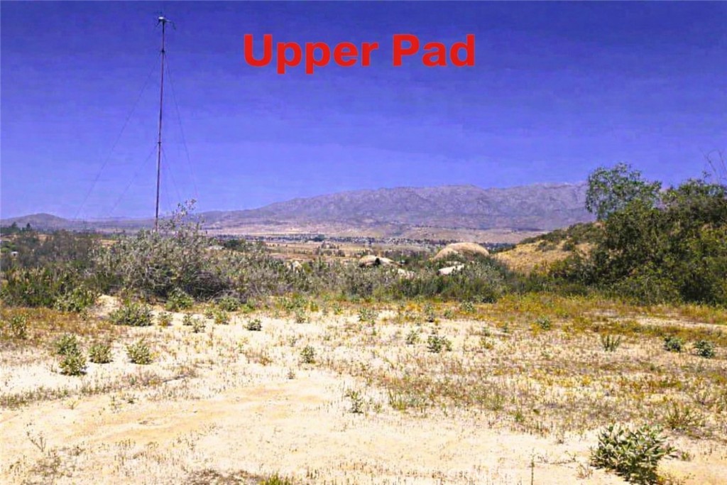 0 Roadrunner Banning, CA 92220 - Photo 11 of 15 a view of a yard with a mountain