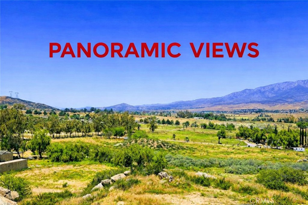 0 Roadrunner Banning, CA 92220 - Photo 2 of 15 a view of swimming pool with a yard and mountain view in back