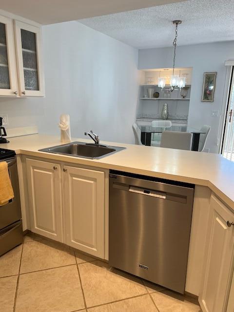 1605 Highway 1, Unit F305 Jupiter, FL 33477 - Photo 11 of 31 a kitchen with stainless steel appliances granite countertop a sink a stove a refrigerator and island