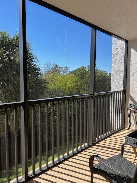 1605 Highway 1, Unit F305 Jupiter, FL 33477 - Photo 27 of 31 a view of a balcony with wooden floor